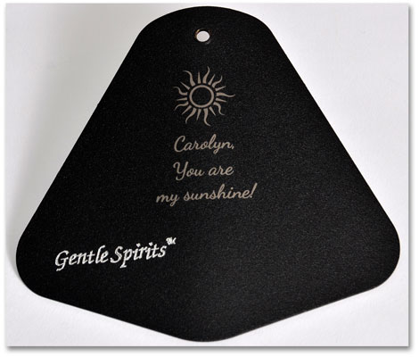 An engraved 'Gentle Spirits' chime sail.